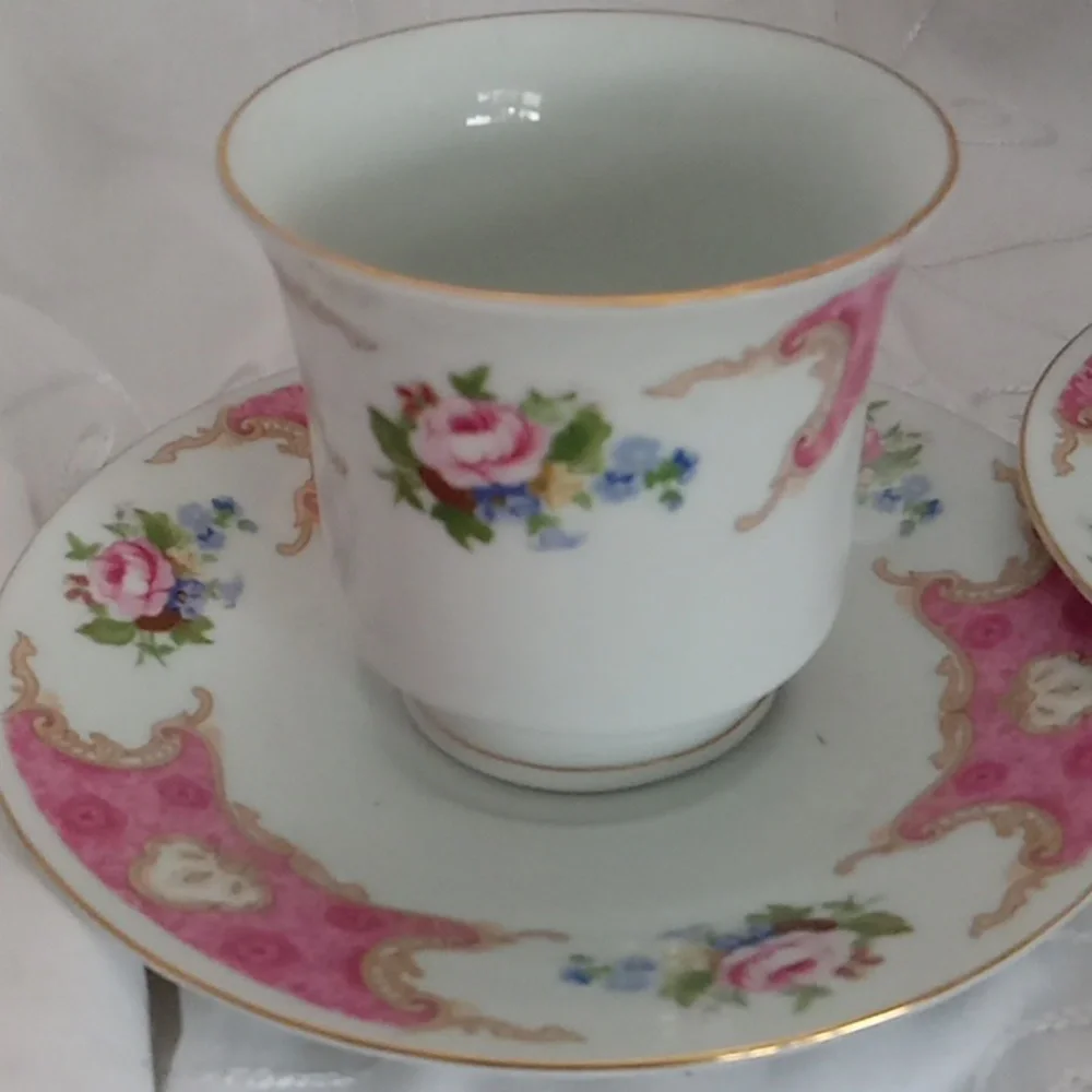 Two Beautiful Dainty Cups And Saucers